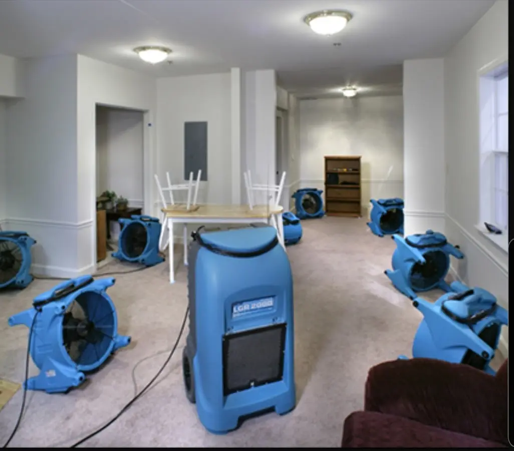 Air movers and dehumidifier setup for Water Damage Restoration in North Bend